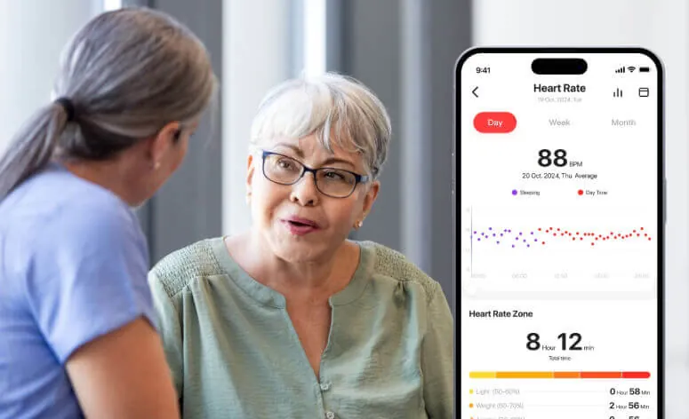 Older woman reviewing Herz P1 heart rate data in the companion app